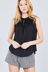 Sleeveless Ruffle Neck W/self Tie Smocked Yoke Detail Front Button Woven Top