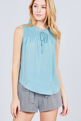 Sleeveless Ruffle Neck W/self Tie Smocked Yoke Detail Front Button Woven Top