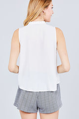 Sleeveless Ruffle Neck W/self Tie Smocked Yoke Detail Front Button Woven Top