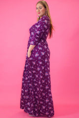 Striped Floral Print Maxi Dress In A Relaxed Fit And Flare Style With A Wrapped V-neck, Short Sleeves, Side Pockets And Waist Tie Belt
